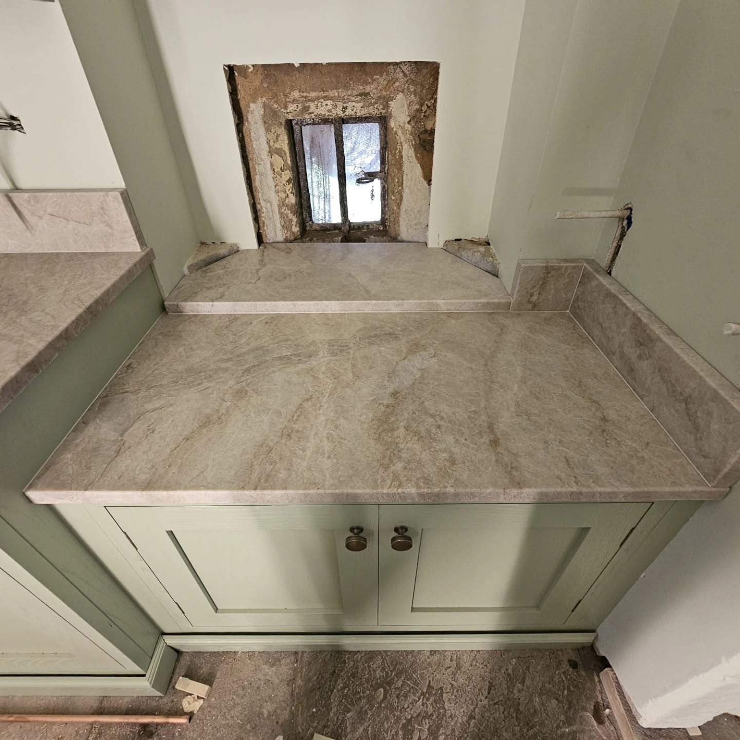 Soft leathered texture on natural quartzite worktops in Cumbria