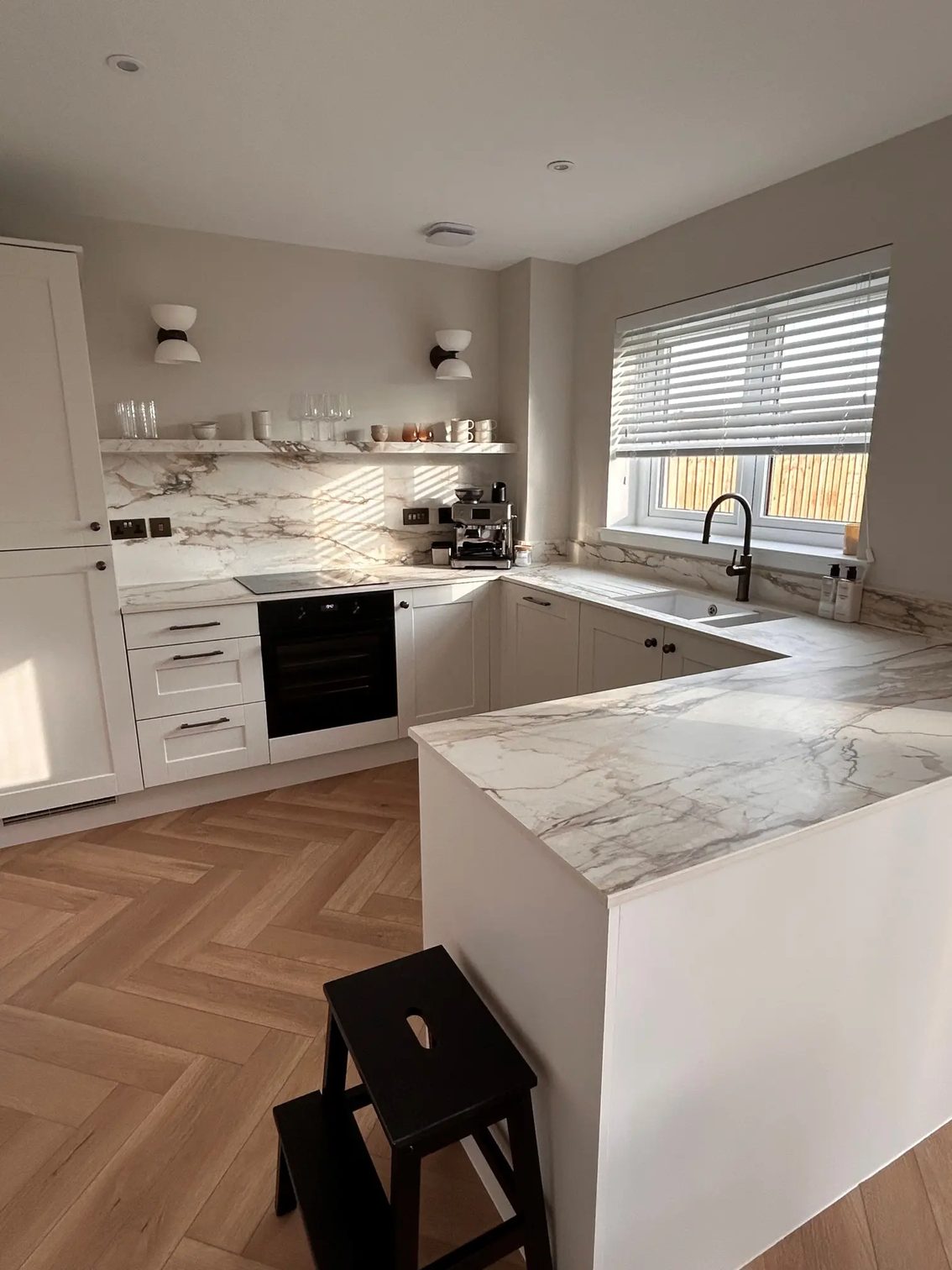 Wide view of the finished Marmo Antico porcelain kitchen near Edinburgh